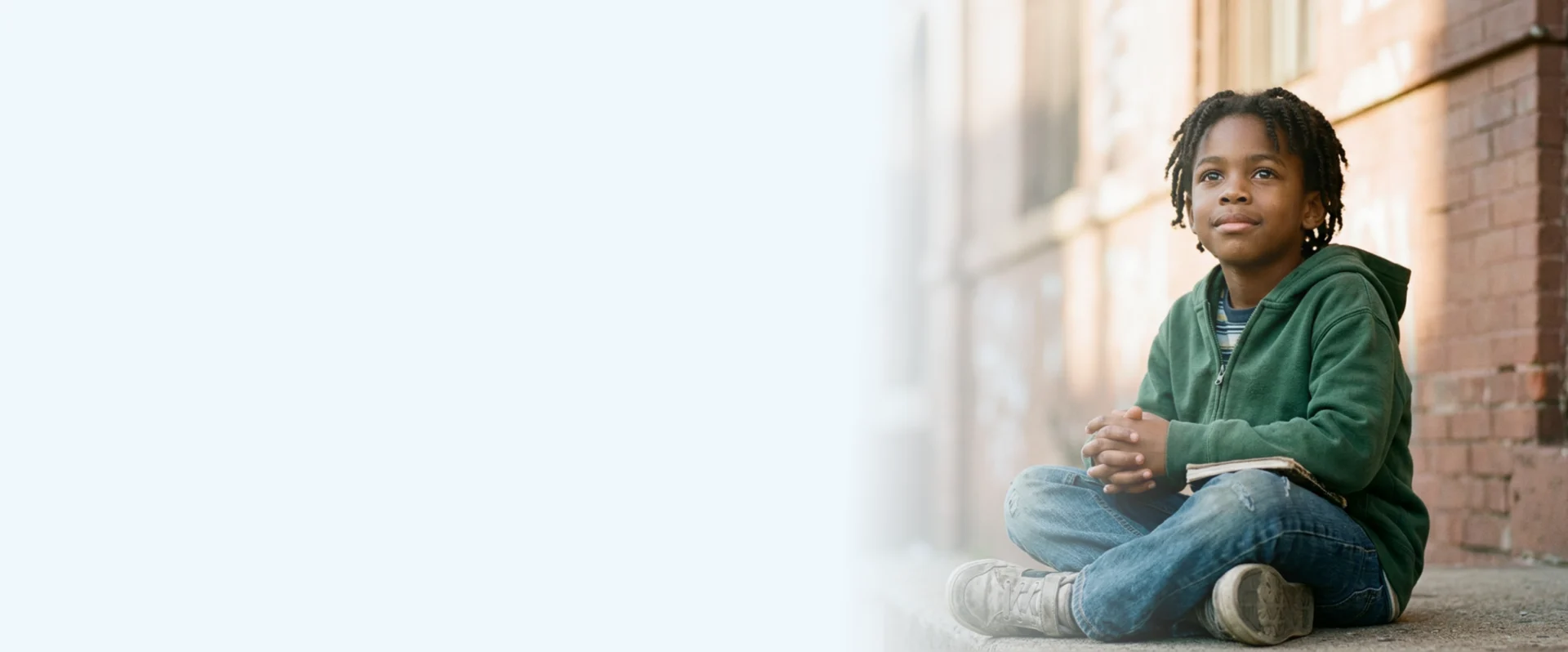 Smiling child supported by Gifting Grace Project in Acadiana